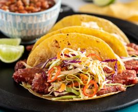 Stout Braised Corned Beef Tacos with Fiery Cabbage Slaw