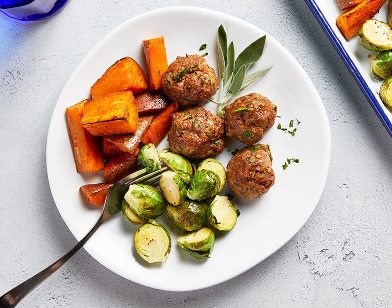 Sheet Pan Beef and Zucchini Meatballs with Maple-Lemon Brussels Sprouts and Sweet Potatoes | Beef Lo
