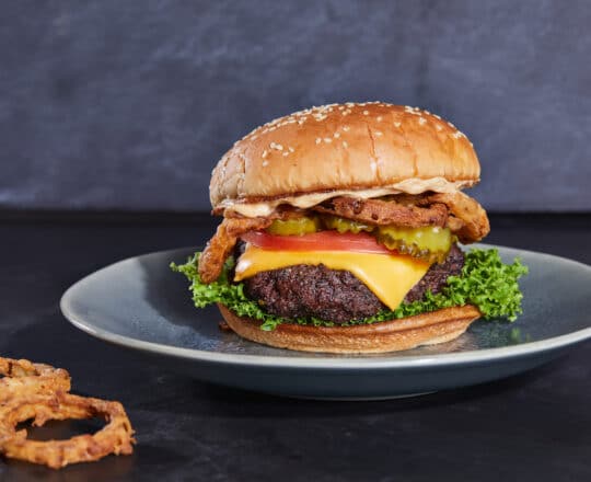 How to Make a Classic Texas Cheeseburger with Haystack Onions